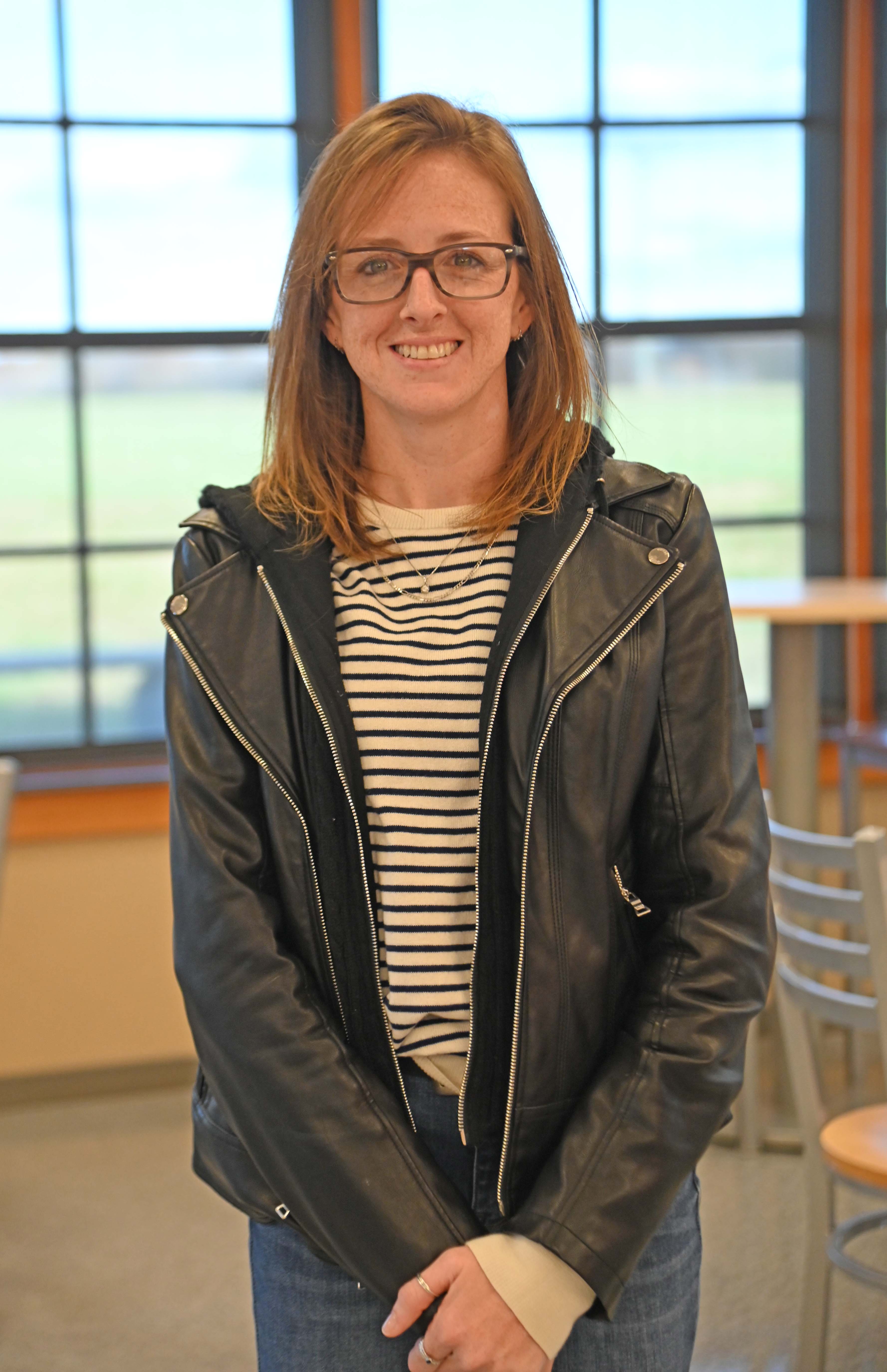 Candice Murphy posing by a window